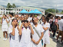 Children in Dili observing the transit of Venus