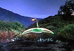 1953 George Pal film adaptation with Martian tripod fighting machines reimagined as manta-ray-like craft that move on three invisible magnetic legs, armed with a cobra-like mounted heat ray and wingtips that fire skeleton beams