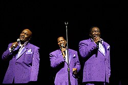 The O'Jays (Walter Williams, Eric Grant, and Eddie Levert) perform at the Arie Crown Theater in Chicago, April 2010.