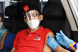 Ramos pictured on June 25, 2021, receiving his second dose of Sinovac's COVID-19 vaccine in Muntinlupa.