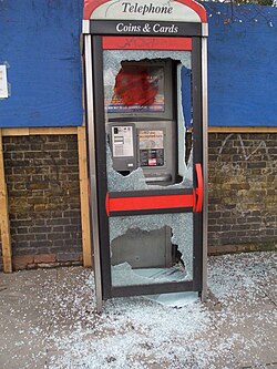 A vandalized KX+ phone box in London