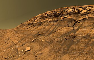 The preservation and cementation of aeolian dune stratigraphy in Burns Cliff in Endurance Crater are thought to have been controlled by the flow of shallow groundwater.[1]