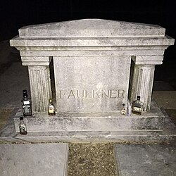 Faulkner's headstone located in St. Peter's Cemetery in Oxford, Mississippi, USA