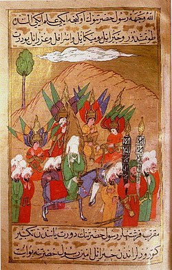 A depiction from the Siyer-i Nebi of Muhammad advancing on Mecca, with his face veiled. The angels Gabriel, Michael, Israfil and Azrael, are also shown.
