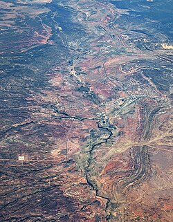 Aerial view from the south, with Window Rock Airport (right of center), Black Creek (lower center), and Tse Bonito, New Mexico (right edge center)