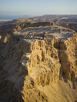 View of the Masada fortress overlooking the Dead Sea, which is the location of a 1st-century Roman siege
