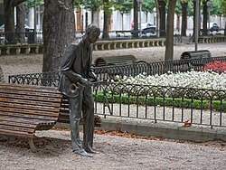 Sculpture of Wynton Marsalis, the bench shows names of musicians who performed at the Vitoria-Gasteiz Jazz Festival over the years