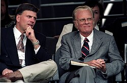 On the left, with his father Billy Graham, June 1994