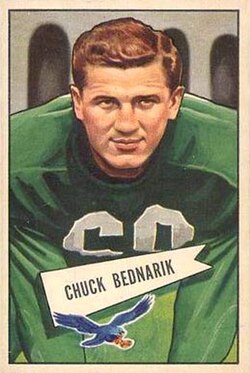 Chuck Bednarik, also known as Concrete Charlie, was a three-time All-American at Penn, inducted into the College Football Hall of Fame and the Pro Football Hall of Fame. He was the first player selected in the 1949 NFL draft (by the Philadelphia Eagles) and won the 1960 NFL Championship.