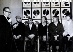 The Beach Boys accepting a gold record sales certification for "Good Vibrations" at the Capitol Tower, late 1966