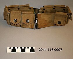 US M1910 ammo belt with "Lift-The-Dot®" type snap fastners designed to lock securely on three sides and release manually from only one specific direction