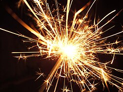 Sparks from a pyrotechnic sparkler.