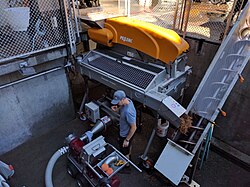 A mechanical destemming machine in use at Chateau Montelena winery in Napa Valley