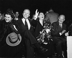 Betty and Gerald Ford join Dwight D. Eisenhower and his wife Mamie Eisenhower at a Grand Rapids, Michigan, event for Dwight D. Eisenhower's 1952 presidential campaign.