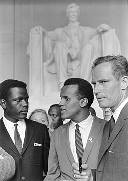 Poitier (left) at the 1963 March on Washington for Jobs and Freedom, alongside actors Harry Belafonte and Charlton Heston