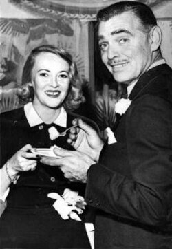 With fourth wife Sylvia Ashley