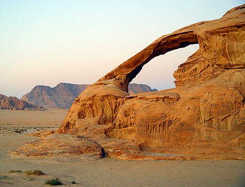 A natural arch produced by erosion of differentially weathered rock in Jebel Kharaz (Jordan)