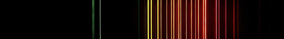 The emission spectrum of neon shows individual wavelengths of light contributing to its perceived color when heated.