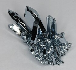 Osmium crystals, grown by chemical vapor transport