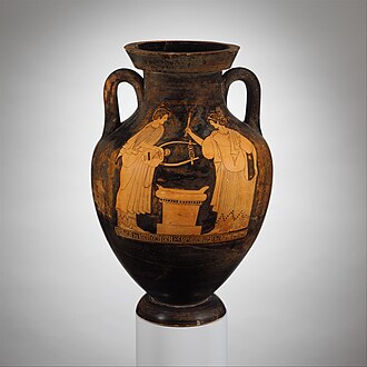 Apollo (left) and Artemis (right) carrying a torch and flanking an altar. Terracotta amphora (jar) 490 BCE. Metropolitan Museum of Art. Manhattan, New York