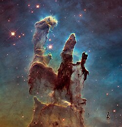 One of Hubble's most famous images, Pillars of Creation, shows stars forming in the Eagle Nebula.