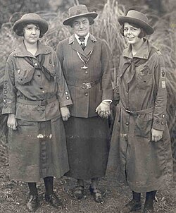 Juliette Gordon Low (center), with two Girl Scouts.