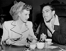 Quinn with Maureen O'Hara, behind the scenes of Sinbad the Sailor (1947)