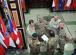 Kabul; Clockwise, Michael Mullen, David Petraeus, James Mattis, John Allen, Marvin L. Hill and German Army Gen. Wolf-Dieter Langheld [de] inside the ISAF headquarters in Kabul.