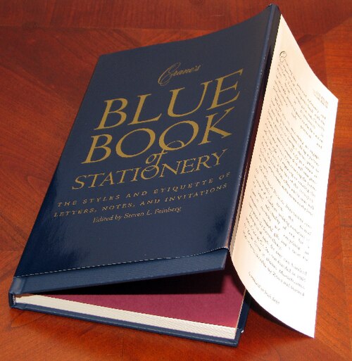 A dust jacket, propped up and partially unfolded for illustration