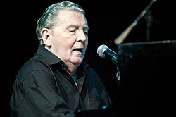 Lewis performing in 2009
