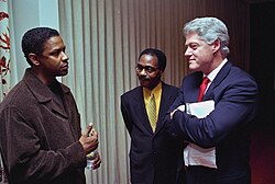 Washington with President Bill Clinton in the White House Family Theater in 1999