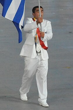 Ilias Iliadis led the Greek team into the Bird's Nest as the traditional first contingent.