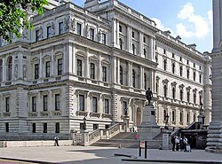 The FCDO Joint Headquarters King Charles Street viewed from Horse Guards Road, with the Statue of Robert Clive and the entrance to the Churchill War Rooms visible