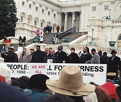 Opponents of Clinton's impeachment demonstrating outside the Capitol in December 1998