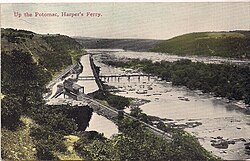 Footbridge over the Potomac Canal and part of the Potomac River to Island Park, a recreation area built by the Baltimore and Ohio Railroad on Byrne Island in Harpers Ferry