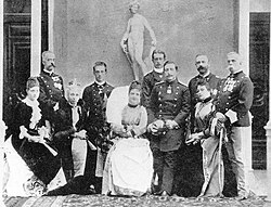 The Italian Royal Family during a royal state visit of Kaiser Wilhelm II at Rome, from left to right, Isabella of Bavaria, Duchess of Genoa, Prince Amadeo, Duke of Aosta, Princess Elisabeth of Saxony, Victor Emmanuel, Prince of Piedmont, Queen Margherita, Prince Henry of Prussia, Wilhelm II, Prince Tommaso, Duke of Genoa, Maria Letizia Bonaparte, Duchess of Aosta, and Umberto I, October 1888