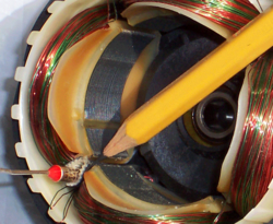 A thermal fuse protecting the windings of a small motor