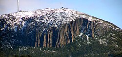 Dolerite forms tall vertical columns throughout Tasmania. These columns form steep vertical features through its alpine areas.