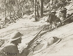 Doughboys of the 18th Infantry, 1st Division, holed in on the side of Hill 240, near Exermont, France, October 1918.