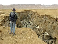 Erosional gully in unconsolidated Dead Sea (Israel) sediments along the southwestern shore. This gully was excavated by floods from the Judean Mountains in less than a year.