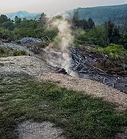 Toxic gas and smoke rising from the ground above the underground fire in 2006