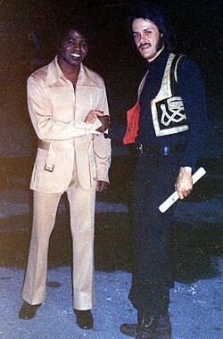 Brown with a disc-jockey after a concert in Tampa, 1972