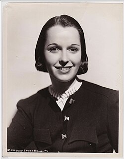 Publicity still of Brooks from Windy Riley Goes Hollywood (1931) featuring her new hairstyle without bangs.