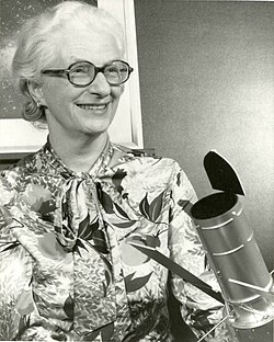 Dr. Nancy Grace Roman with a model of the Large Space Telescope that was eventually developed as the Hubble Space Telescope. While listed as a 1966 photo, this design was not the standard until the mid-1970s.