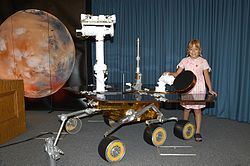 Sofi Collis with a model of Mars Exploration Rover