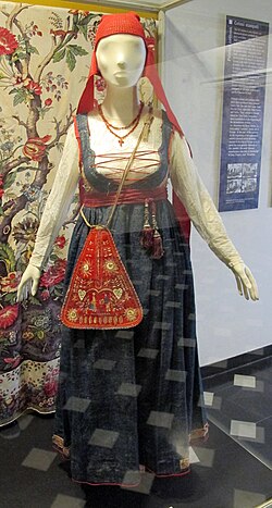 A traditional women's Genoese dress in "blue jeans" (1890s). Palazzo Spinola di Pellicceria, Genoa, Italy.