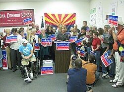 Giffords during a press conference following her 2010 election victory