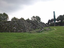 Remains of "Cuicuilco B" within the sport center, visible in the background the sculpture Disco Solar