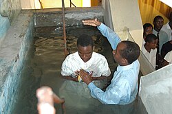 Baptism of young man in Mozambique