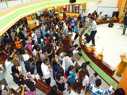 Pentecostals pray in tongues at an Assemblies of God church in Cancún, Mexico